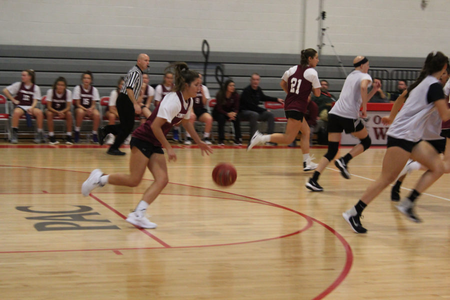 High hoops: Girls basketball team adjusts to season changes
