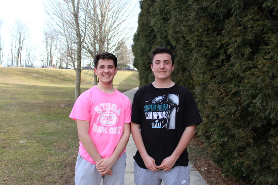 Smiling together: The shot put team of two stands proud after completing an afternoon of spring track and field practice. The boys competed during the winter season without any other shot put throwers.