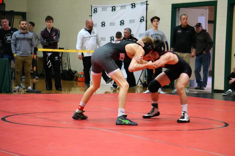 Junior Liam Walker wrestles his opponent at the Central League Tournament. Next year, they hope to become the outright Central League Champions.