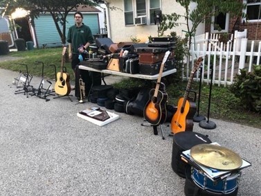 Refurbished and reused: junior collects second-hand instruments for kids in need