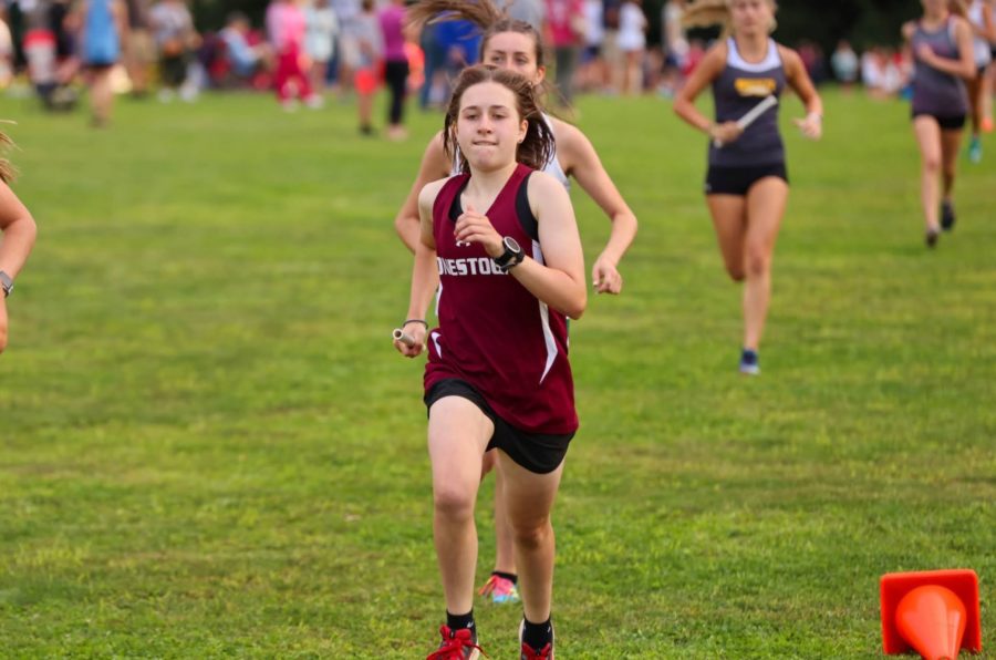 Crossing Barriers: Lizzie Gares Sprints into first year on the cross country team