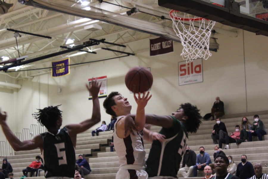 Boys basketball takes down Ridley at home