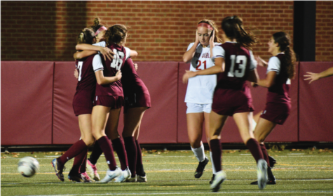 Bringing it in: The girls soccer players hug it out after scoring a goal in the playoff game on Nov. 3, qualifying them for districts. The team was number one in the PIAA for the majority of the season.