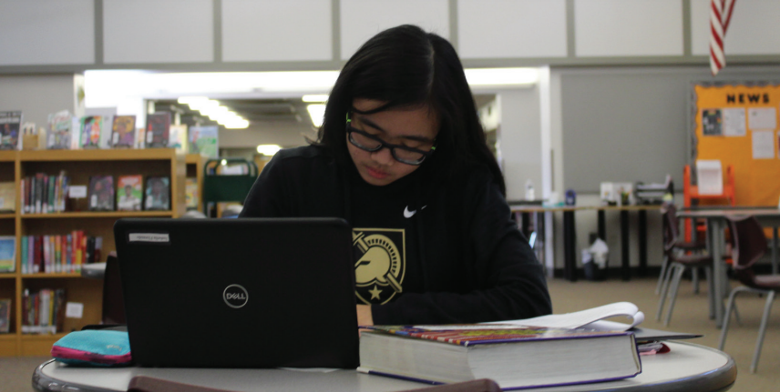 Taking note: Sophomore Isabella Florendo studies for an AP Spanish test in the library. Conestoga administration discontinued assessment days with the hope that it will increase flexibility for both students and teachers.