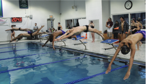Victory lap: Boys and girls swim succeed at districts