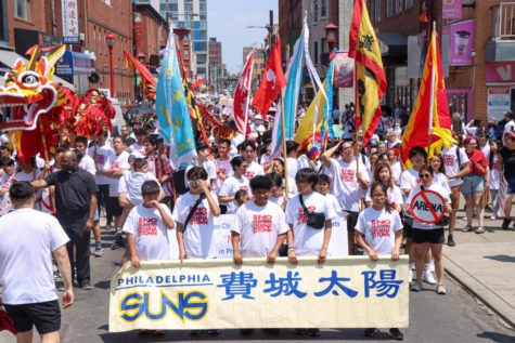 Demonstrators march in protest of predatory developments in Chinatown