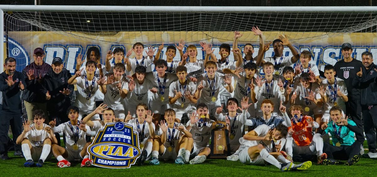 Six-time champs: The boys’ soccer team poses for a team photo after winning the PIAA 4A State Championship. Players held up six fingers as the Nov. 17 win marked the team’s sixth state title. Seventeen of the 31 members of the team will graduate in June.