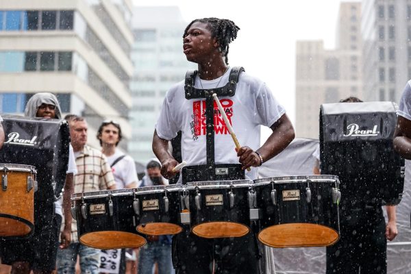 Percussion with a purpose: A member of Positive Movement Drumline, an organization dedicated to inspiring youth through music and community engagement, plays through the rain as crowds chant “When our culture is under attack, what do we do? Stand up, fight back.” In July 2022, Philadelphia 76ers’ managing partners David Blitzer and Josh Harris announced a plan to build 76 Place, an approximately $1.3 billion privately funded stadium for the team. “An arena seems like a very exciting thing on the surface, but I think that there isn't a place or circumstance in which having something fun and exciting could ever really trump all the damage that it would create to this entire community,” senior and Co-Vice President of Conestoga's Asian Student Alliance Audrey Nguyen said.