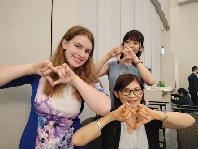 Heart hands: Senior Mary McDonald (left) poses with Taiwanese locals. This summer, as part of the NSLI-Y program, McDonald attended language-learning classes at a university, hoping to improve her Mandarin skills.