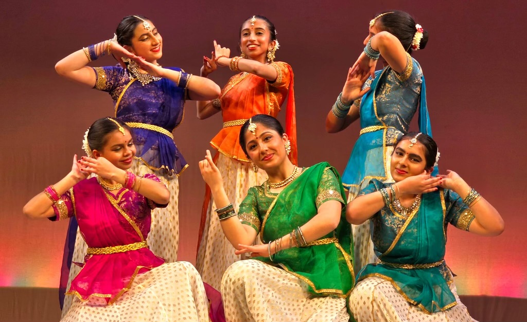 Painting the picture: Junior Vibudha Tandon (top left) and her team perform a Kathak dance. Tandon began the sport when she was 5 years old before studying dance at the Nupoor Dance School. Kathak originated from northern India and is known for its distinct storytelling ability, which facial expressions help convey, and precise footwork.