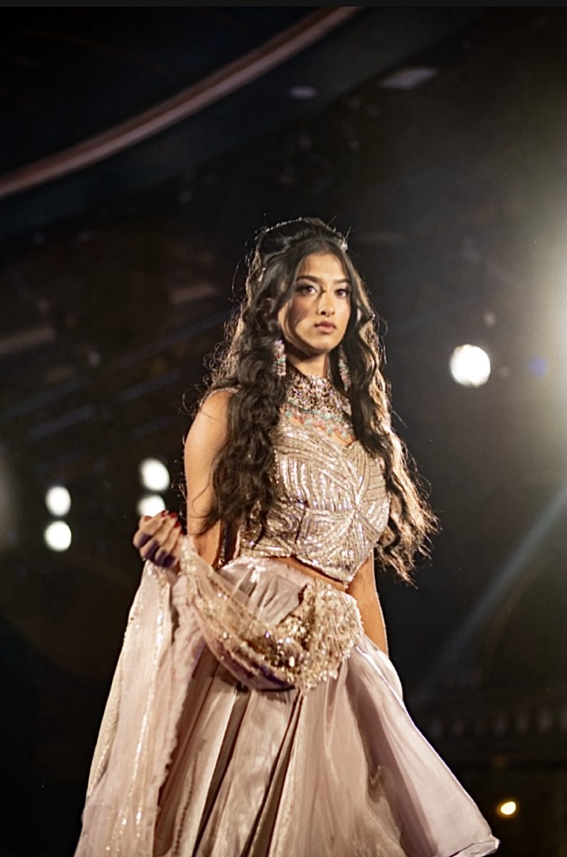 Stunning showcase: Sophomore Shirin Patel walks down the runway at GlambyRissh’s fashion show during New York Fashion Week. Patel and junior Ridhima Parnati modeled Indian clothing and jewelry at the event. 