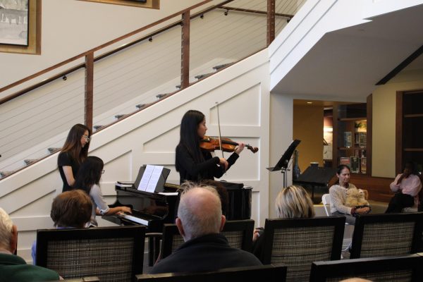 Musing melodies: Senior Lauren Wu plays the violin at the Brightview Senior Living Center in Devon. Wu organized performance opportunities throughout the district as Chamber Music Club president. 