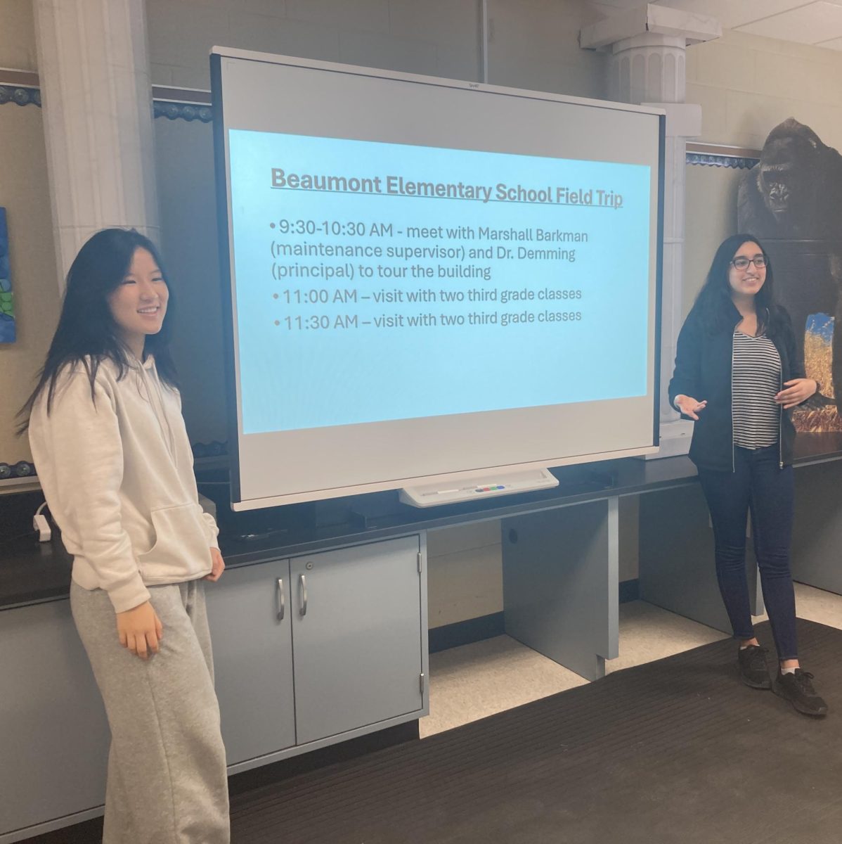 Data analysis: Seniors Paulina Yang and Shriya Prakash explain the Beaumont audit at a club meeting. They collected data on resource usage and consumption patterns during their visit on Feb. 11.