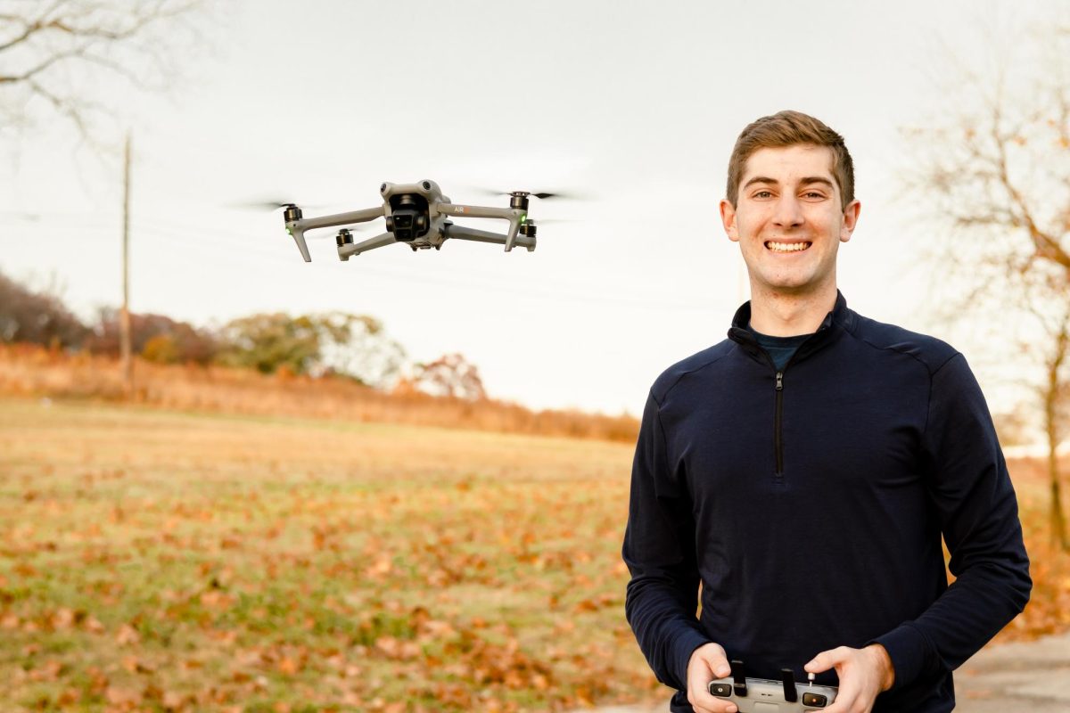 Business owner: Senior Mason Garcia flies a drone on a fall day. He started Mastershot Aerials with the help of his uncle.