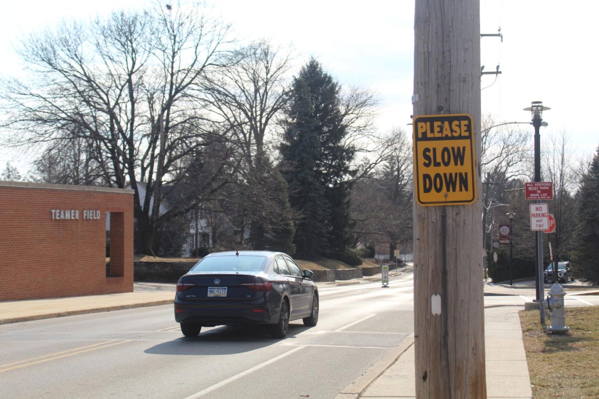 Slowing down for safety: A “Please Slow Down” sign is posted near Conestoga Road, a street where the speed limit decreased to 25 mph. Tredyffrin Township administration implemented the change to protect students and commuters.