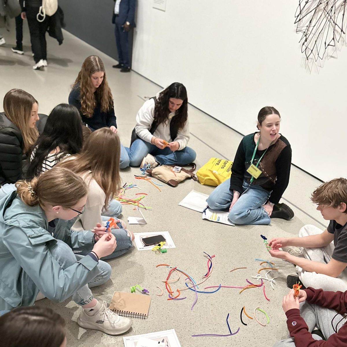 Working together: Spanish 4 students complete an activity as part of their class trip to the Museum of Modern Art (MoMA) in New York. The Spanish teachers gave a list of the artists they focused on in class to the museum tour guides so that they could highlight these artists’ work at MoMA.