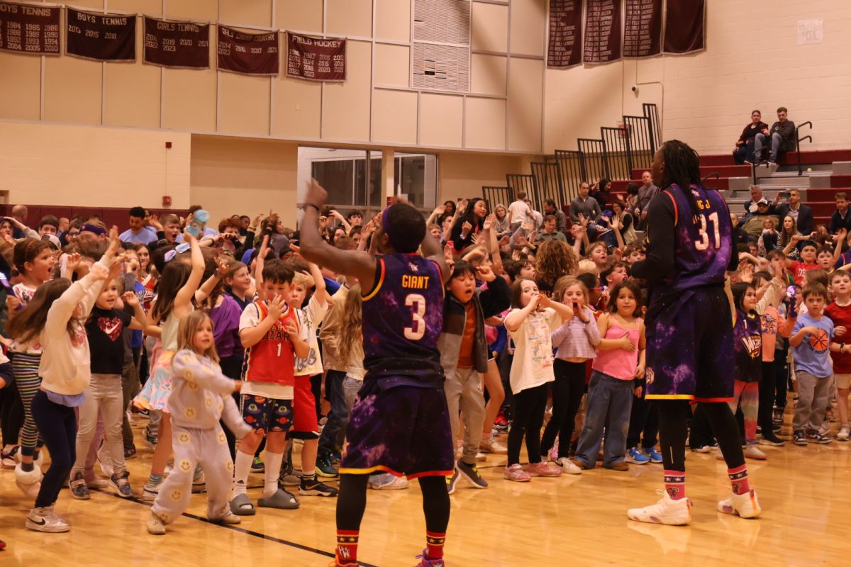 Charisma on the court: FLITE holds annual Harlem Wizards Game