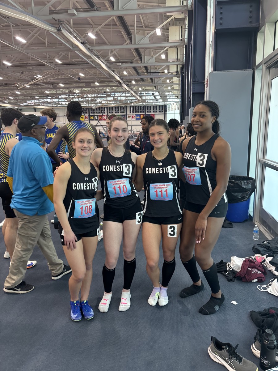 Relay runners: 4x200-meter relay runners (from left to right) sophomores Bianca Antonacci and Kate Gennarelli, freshman Price Orcutt, and junior Fure Abhulimen prepare to run at the state championships. The team achieved its personal record at the championship and placed 11th overall.
