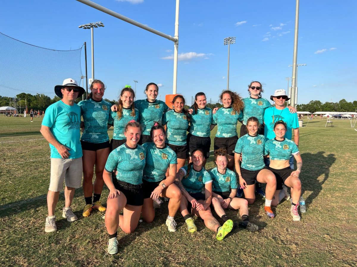 Rising rugby: Atlantis’ women’s senior elite rugby team, including alumnae Elsa Burgo and Sarah Durant, poses together at the Tropical Sevens tournament.  The team took seventh place overall in the tournament. Both alumna hope to compete with Atlantis again in the future.