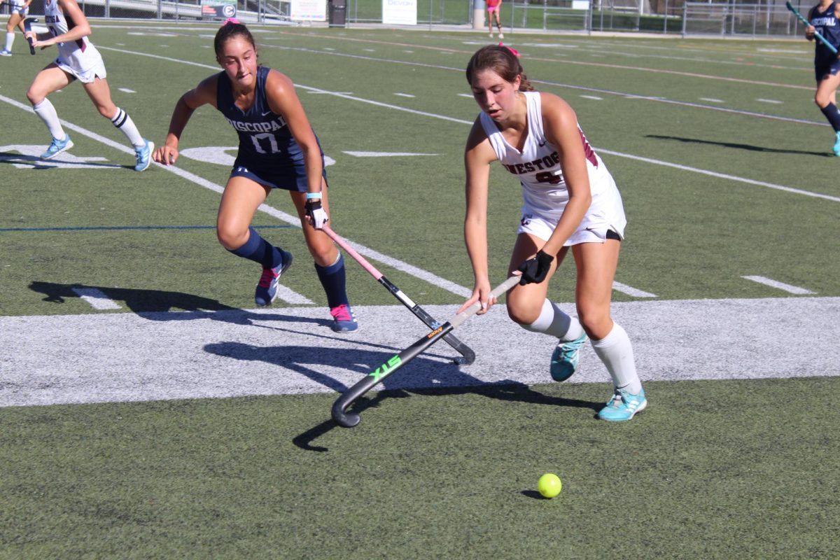 High pressure hockey: Sophomore Peyton Esposito chases the ball during a game against Episcopal Academy. She played for the U.S. Women’s Under-16 National Field Hockey Team for the Four Nations Tournament. In the future, she hopes to represent the U.S. at the Olympics.