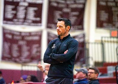 Watchful gaze: Varsity boys basketball head coach Sean Forcine observes his players during the home opener against Upper Darby on Dec. 17. The Pioneers won 58-44 and went on to win the district championship in the 2024-25 season.