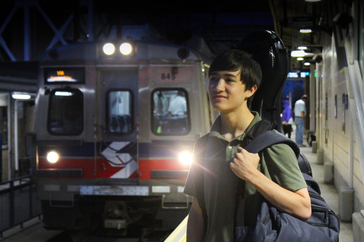 Early-morning commute: Senior Daniel Loza waits at the Paoli SEPTA station for his train to Center City. SEPTA’s service cuts and fare increases affected him and other community members who use the Paoli-Thorndale line to attend events around the area.