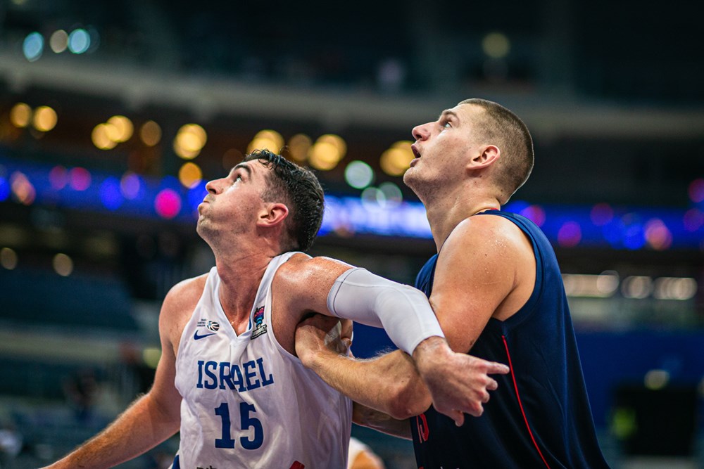 Maccabi maestro: 2009 alumnus Jake Cohen (left) plays for Israeli National Team during the 2022 FIBA EuroBasket group stage match between Israel and Finland. When Cohen played for Conestoga, he was named Central League MVP and Chester County Player of the Year. After retiring, he will spend more time with his family, such as spending Thanksgiving with them for the first time in 17 years.