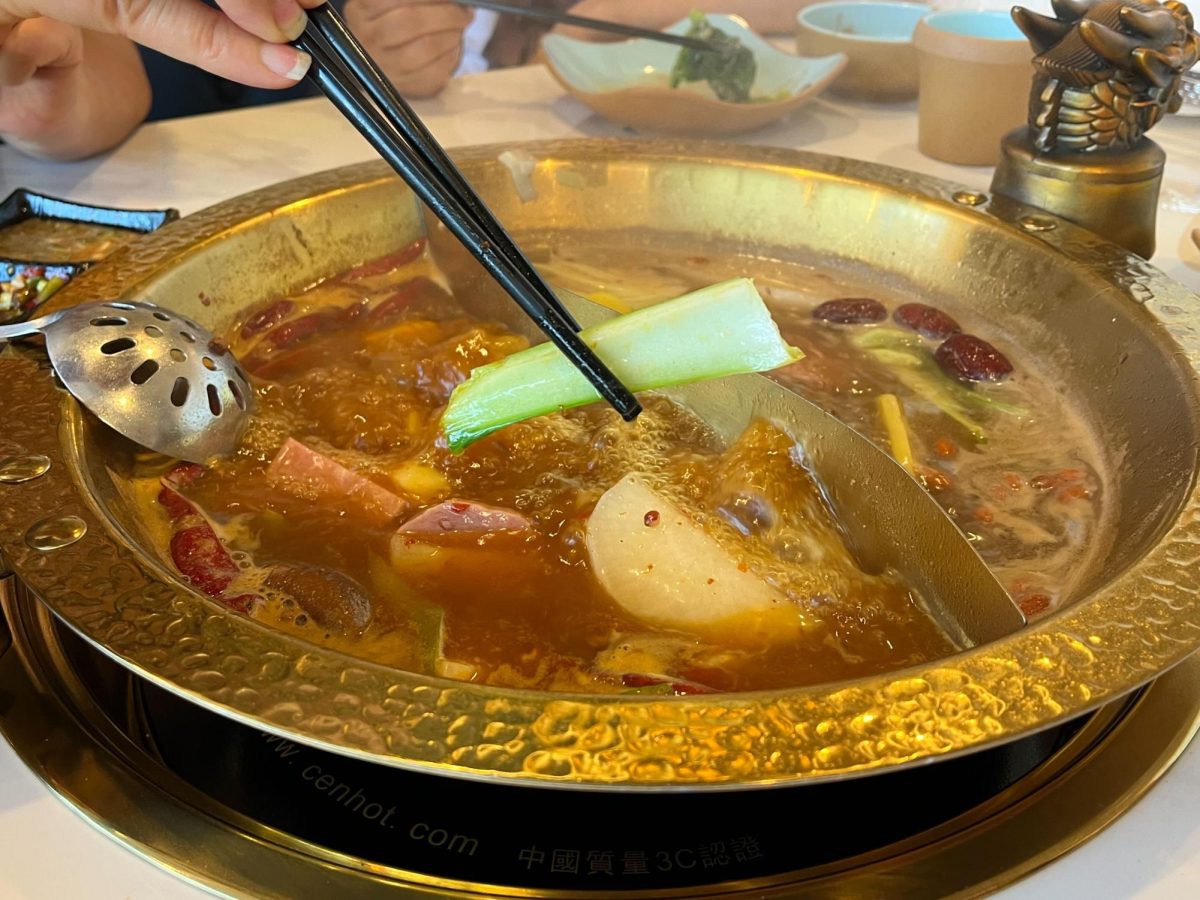 Bubbling broth: The hot pot options at Asian fusion restaurant Gyu Hakata come with a customizable selection of meats and vegetables. The split soup base provided a variety of flavors and spices to cook the ingredients in.