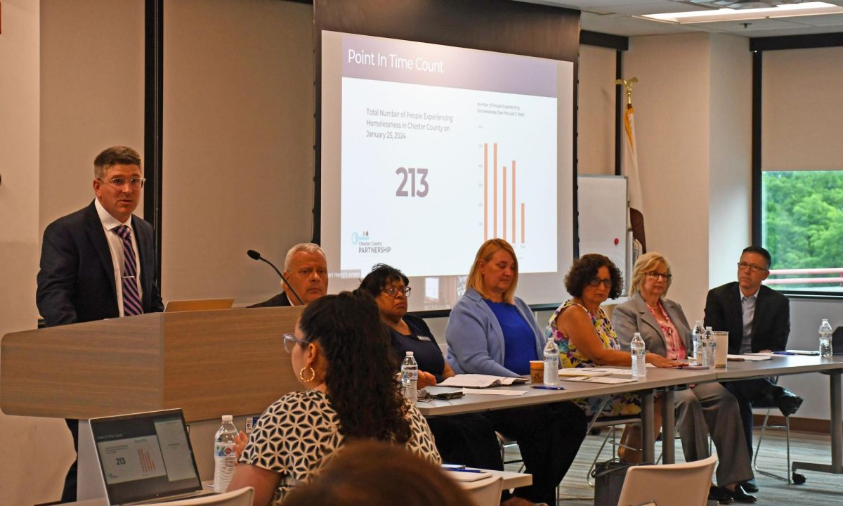 Addressing affordability: Partnership to End Homelessness Administrator Robert Henry speaks at a poverty simulation in Coatesville. Chester County partners hosted the poverty simulation to shine a light on poverty’s effects in the community.