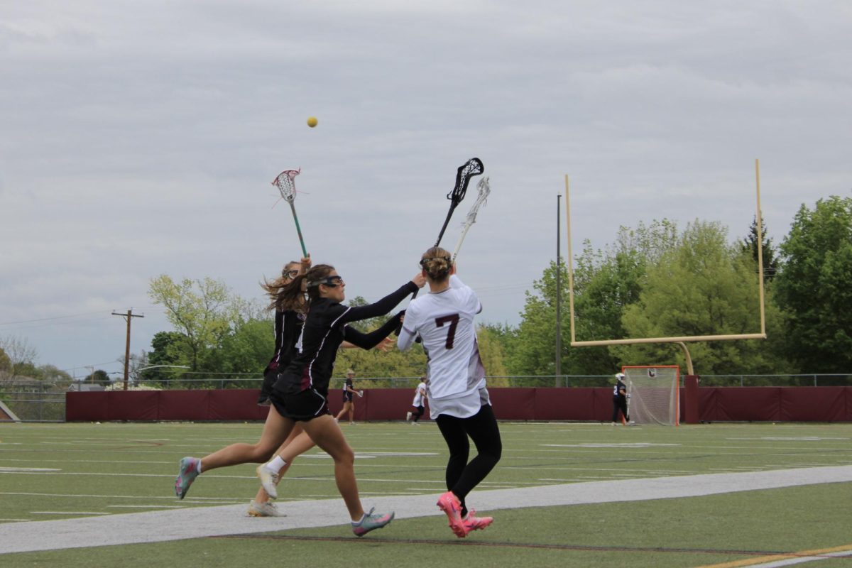 Girls lacrosse takes narrow loss to Henderson 8-7