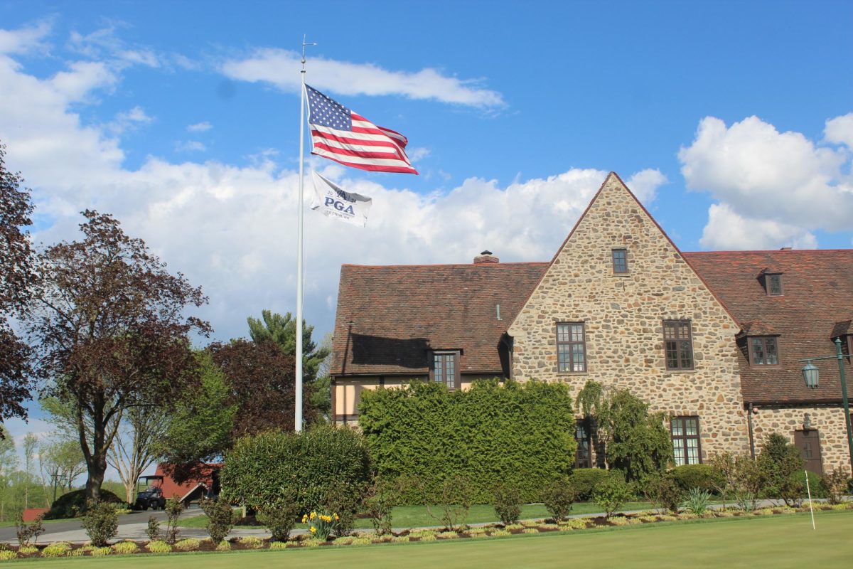 Grand golfing: A flag displaying the Professional Golfers’Association (PGA) logo waves in the wind above Aronimink Golf Club. Aronimink has been closed since early Nov. 2025 to prepare for hosting the 2026 PGA Championship. The club will hold the championship from May 14-17 and organizers expect 200,000 people to attend.