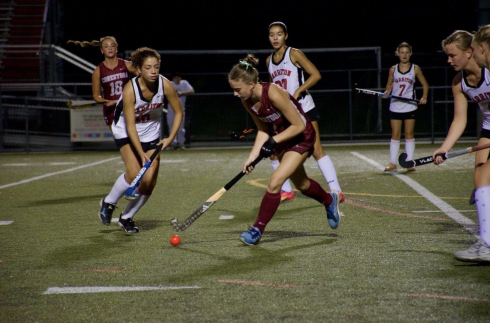 Field hockey fame: Freshman Brynn Wozniak (front and center) takes the ball and aims for the goal at a school match. She played for the U-16 Women’s U.S. National Team as one of the younger players in the division. Wozniak hopes to try out and compete for the team again next year.