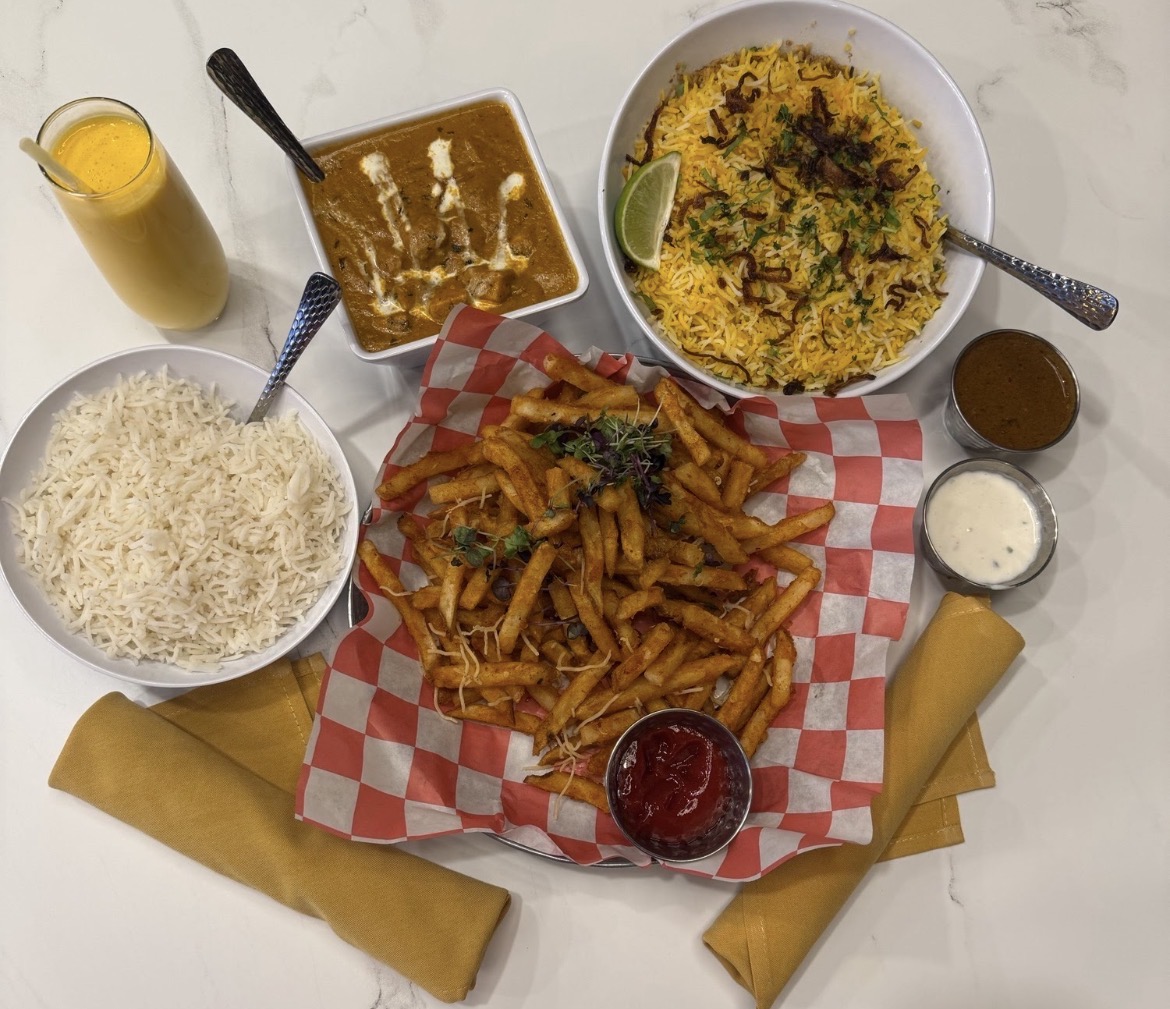 Fries to feast: Vibe Haus has a variety of dishes to choose from on its menu. The restaurant served the fries with a side of ketchup and paired the biryani with a yogurt sauce and tamarind sauce.