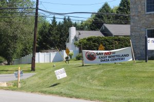 Continued discontent: Signs continue to advocate against the Sentinel Green Fig Data Center, even though the expansion was renounced in May. The AI data center proposal in East Whiteland Township prompted nearby townships to draft legislation regarding AI data centers.